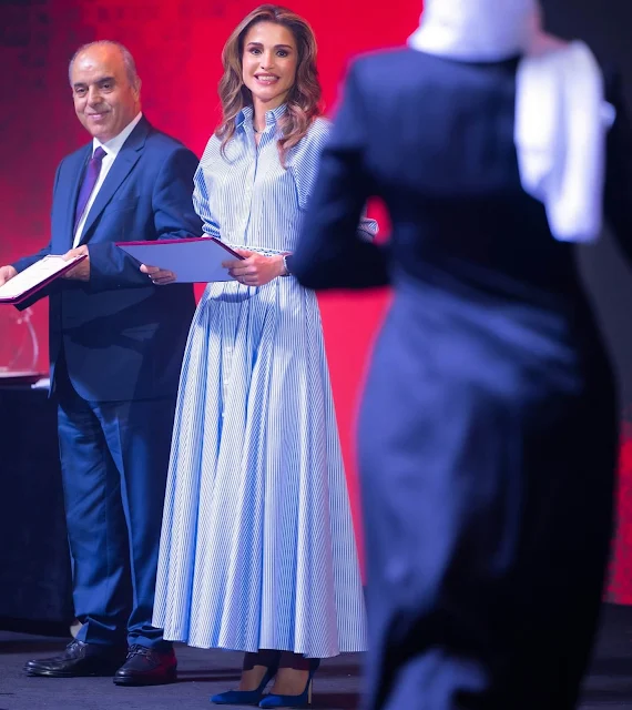 Queen Rania wore a blouson sleeve striped cotton shirt dress by Brandon Maxwel. Dior navy suede pumps