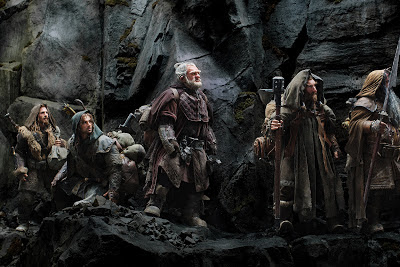 the hobbit an unexpected journey, dwarves walk through the mountains, directed by Peter Jackson