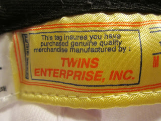 Twins Enterprise ball cap label