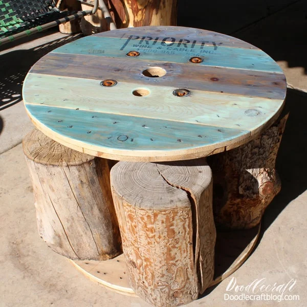 This spool table has a fun nautical vibe and it's perfect for sitting on the patio for lunch! This blue finish is not quite ombre, but has variegated blue tones for the perfect Summer-ocean inspired furniture upcycle.