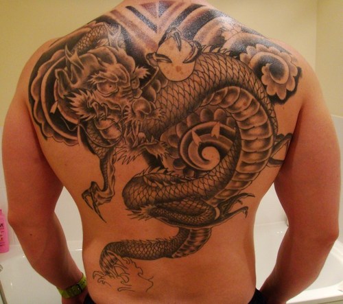 dragon tattoo designs for legs. Big Dragon Tattoo Designs On