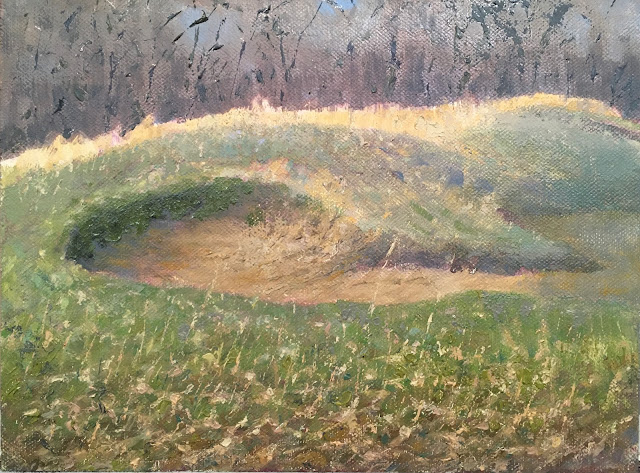 oil sketch of sandtrap, overgrown with weeds and grass. The late afternoon light illuminated the yellow-orange stalks against background of dark trees. In the foreground, the complicated patterns of grass, weeds, and dirt create an abstract composition.