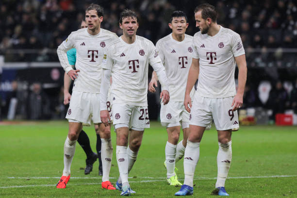 Players of Bayern Munchen are seen disappointed after a goal scored by Eintracht Frankfurt during the Bundesliga match between Eintracht Frankfurt and FC Bayern München at Deutsche Bank Park on December 09, 2023 in Frankfurt am Main, Germany