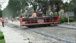 Amazing Brick Machine Rolls Out Roads Like Carpet