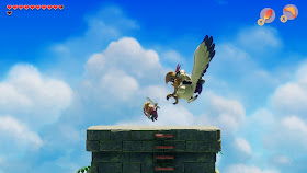 screenshot of Link fighting the Evil Eagle in the Link's Awakening remake on top of the Eagle's Tower