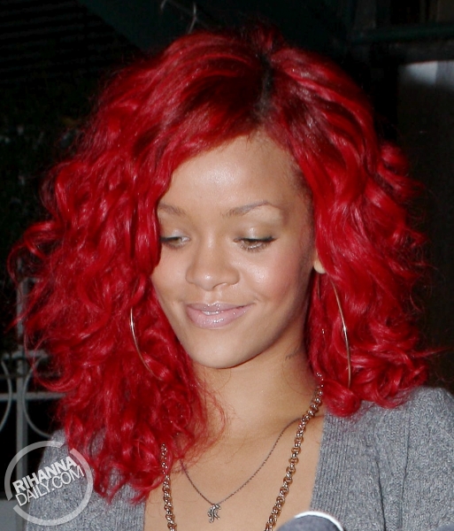 rihanna red hair curly. Rihanna#39;s New Candy Apple Red