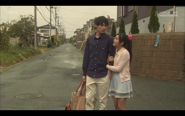 Naoki walks an injured Kotoko home. Kotoko clings to Naoki more than perhaps is necessary. 