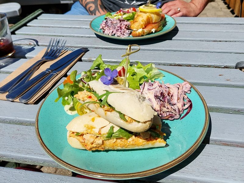 Panina and croissant lunch at Torta Findhorn, served with homemade slaw and edible flowers