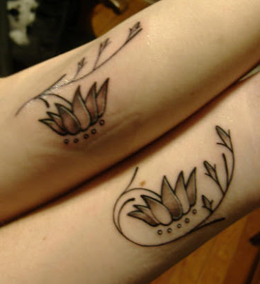 friendship tattoos,snal tattoo designs,flower tattoos