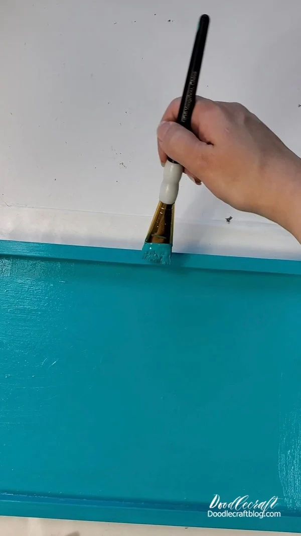 Step 1 for Decorative Tray: Paint  Begin by painting the tray whatever color you love.   I am using Plaid Paint and of course, picked a shade of turquoise blue that I love.