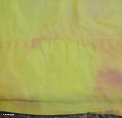 turmeric-dyed cotton where a drop of vinegar changed the color to yellow