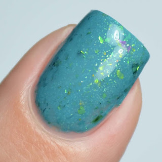 teal nail polish with green flakies