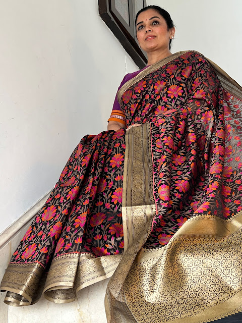 Black Banarasi kota saree with a floral iaal