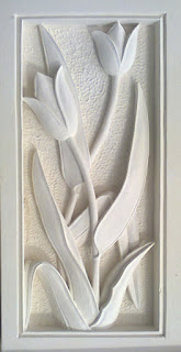 Relief batu alam paras jogja motif bunga tulip