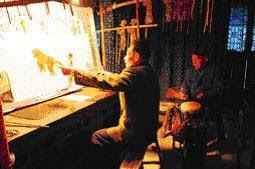 shadow puppet master wuzhen