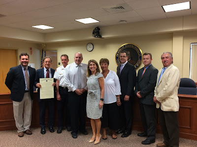 (from Left): Greg Casey, Chief of Staff Senator Richard Ross; Town Administrator Jeff Nutting; Deputy Fire Chief Paul Sharpe; Town Councilor Bob Dellorco; Lt. Governor Karyn Polito, Town Councilor  Deb Pellegri; Town Councilor Peter Padula; Town Councilor Matt Kelly; Dennis Giombetti, Office Senator Karen Spilka.