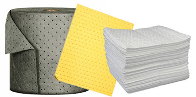 Oil and chemical absorbent pads