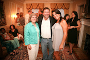 Holly Petraeus (left) with Scott Kelley (center) and Jill Kelley (right) at .