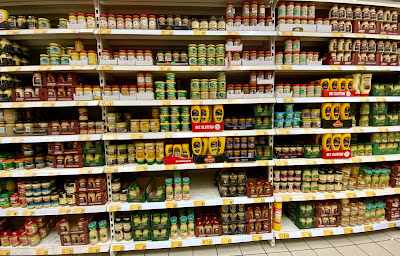 mustard section in Auchan grocery store in Poland
