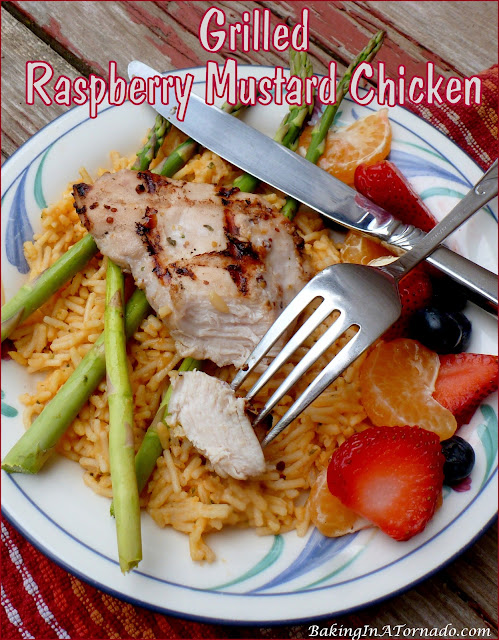 Grilled Raspberry Mustard Chicken is a quick, easy dinner, marinate, grill, serve. | recipe developed by www.BakingInATornado.com | #recipe #dinner