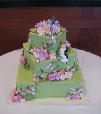 A bit different in style this cake was also iced in a yellow green