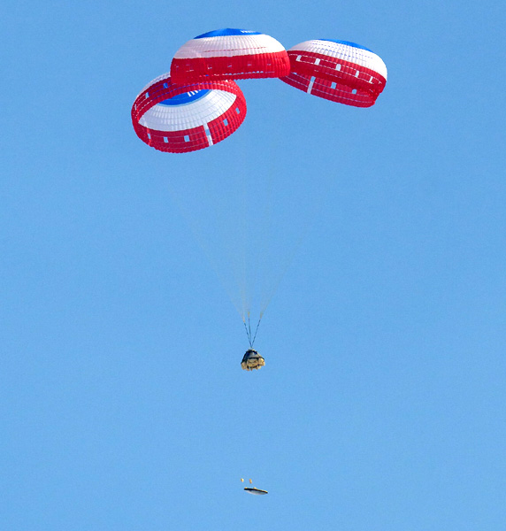 Starliner releases its heat shield prior to inflating its six airbags just as the Boeing capsule approached its landing zone at White Sands Missile Range’s Space Harbor in New Mexico...on May 25, 2022.