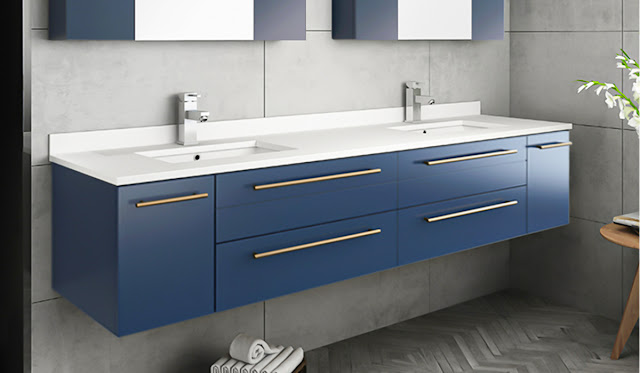 Blue modern vanity by Fresca with white countertop and sink.