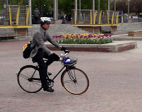 gentleman on a Raleigh three speed bike