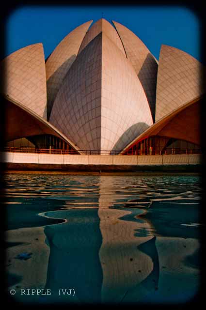 A good place to visit in Delhi : Lotus Temple @ Nehru Place, Delhi, INDIA: Here are some some miscellaneous shots of Lotus Temple. The construction of the temple is similar to that of the Opera House in Sydney. The temple always looks mesmerizing. However, different light conditions have different effect on the way the temple appears.: Posted by Ripple (VJ) on PHOTO JOURNEY @ www.travellingcamera.com : ripple, Vijay Kumar Sharma, ripple4photography, Frozen Moments, photographs, Photography, ripple (VJ), VJ, Ripple (VJ) Photography, Capture Present for Future, Freeze Present for Future, ripple (VJ) Photographs , VJ Photographs, Ripple (VJ) Photography : Reflection of the temple in the clear, shimmering water of the pond.@ LOTUS TEMPLE, Nehru Place, Delhi, INDIA