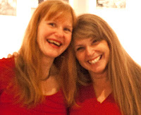 Photo of Robin and Sheila in Red Dresses