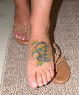 Leo Sign Zodiac Symbol Tattoo on Girls Foot