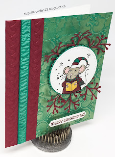 Linda Vich Creates: Merry Mice. One of the Merry Mice sings atop a holly-embossed matte, enriched with Inka Gold.