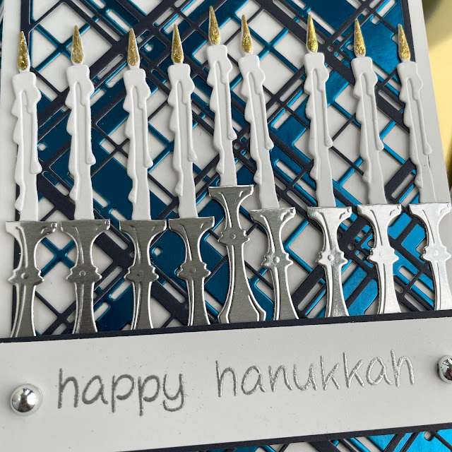 Hanukkah Card created with: Tim Holtz layered plaid die, colorize candlelight, metallic kraft cardstock; Scrapbook.com solar white cardstock, smart glue; Ranger silver embossing powder; The Crafters Workshop champagne gold foil; Pinkfresh silver pearls