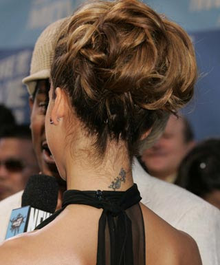 Jessica Alba tattoo On her Lower Backfnfhn cg