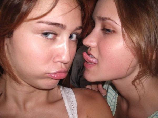 Young starlets Miley Cyrus and Emily Osment pal around and then cuddle with