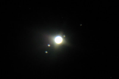 Jupiter and Galilean moons through telescope