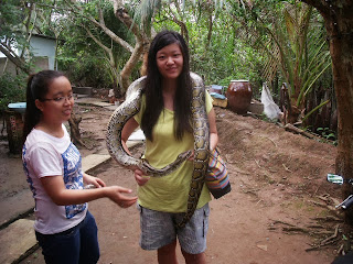 joanna lai carrying a python