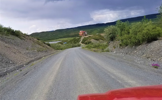 View of a house and a gravel road