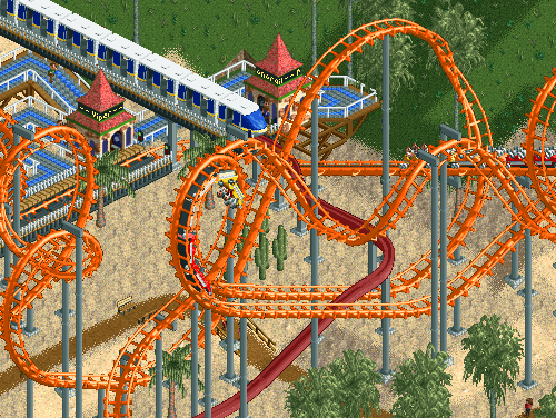 No gif: Jogo de montar parque Roller Coaster, mostrando uma montanha russa com um carrinho descendo de um looping. Como o gif é pequeno, fica eternamente repetindo esse trechinho sem realmente descer. 