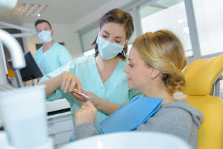 Patient Determing What Brightness Of Teeth She Wants