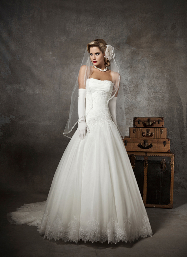 Style 8625 Strapless soft sweetheart pleated french tulle accented with 