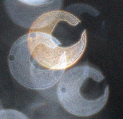 spoon-shaped orb hole