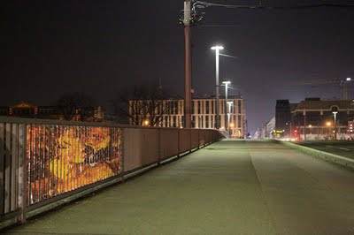 Amazing painting on barred fence