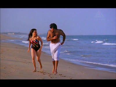 Amala in Bikini from Kodi Parakkuthu