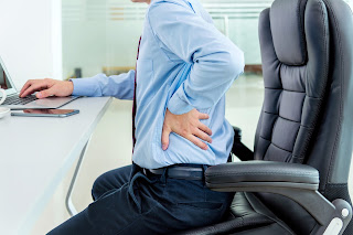 3 Warning Signs You’re Holding Tension in Your Lower Back - Academy Massage - Massage Therapist Winnipeg