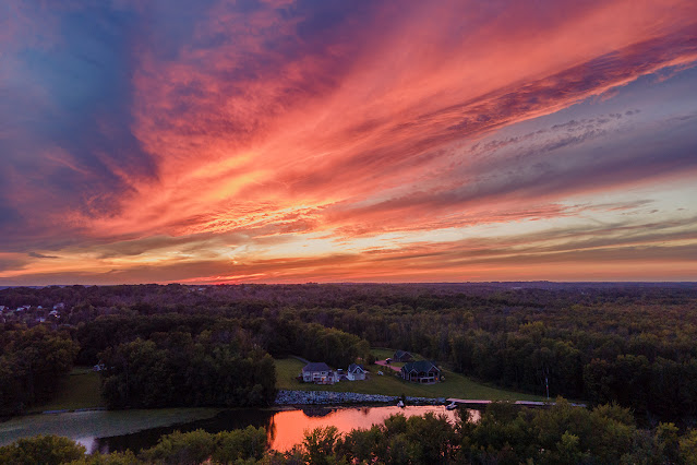 A late-summer sunset reflects off the Seneca River at Liverpool, NY