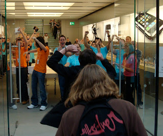 First customers going through the door of Belfast's new Apple Store