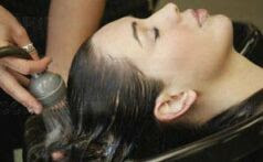 woman-getting-her-hair-rinsed-in-a-salon