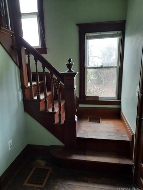 entry hall staircase color photo with original woodwork 44 Colchester Ave East Hampton CT Sears Avoca Sears 109