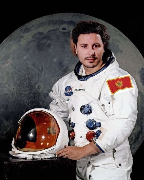 Dritan Abazovic dressed as an astronaut with the flag of Montenegro; Source: Facebook